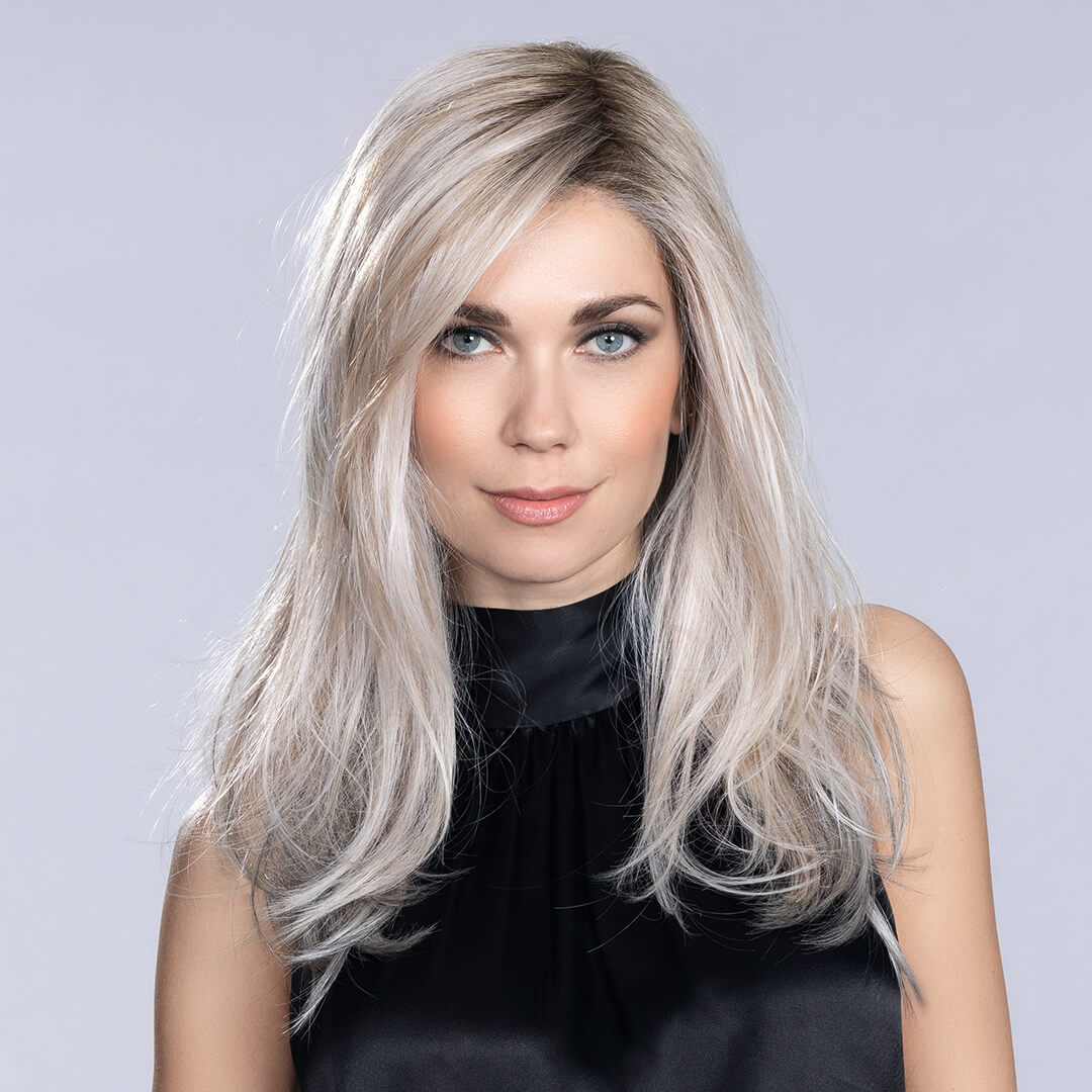 Bild med nio småbilder med kvinnor i peruker i olika frisyrer från Ellen Wille